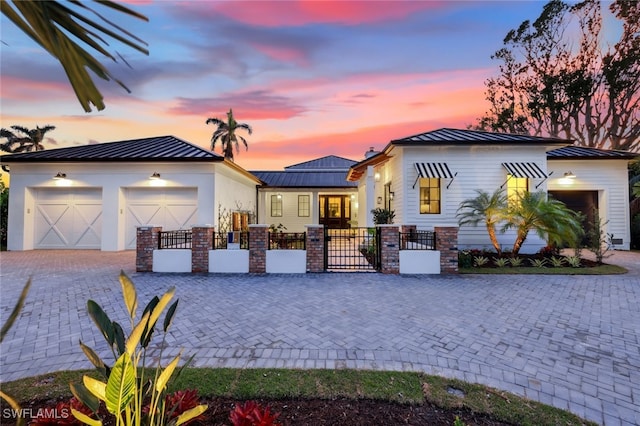 view of front of property featuring a garage