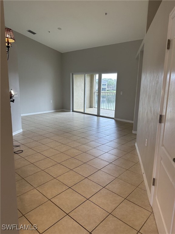 view of tiled spare room