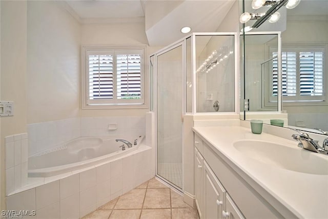 bathroom with ornamental molding, tile patterned floors, separate shower and tub, and vanity