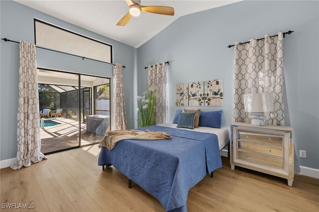 bedroom with light wood-style floors, access to outside, a sunroom, and lofted ceiling