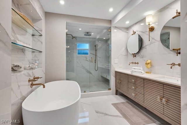 bathroom with vanity, independent shower and bath, and tile walls