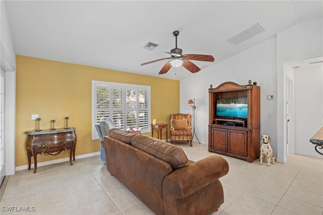 tiled living room featuring ceiling fan