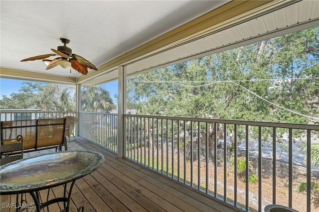 wooden deck with ceiling fan