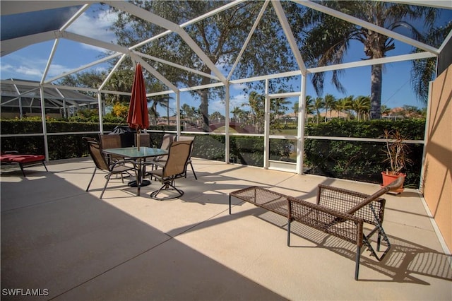 view of patio / terrace with a lanai