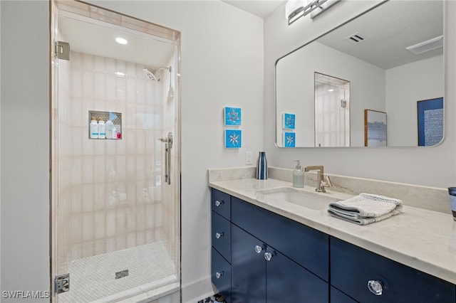 bathroom featuring vanity and walk in shower