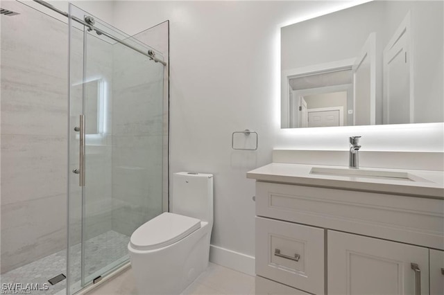 bathroom featuring vanity, toilet, a shower with shower door, and tile patterned flooring