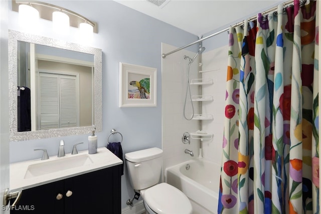 full bathroom featuring vanity, toilet, and shower / tub combo