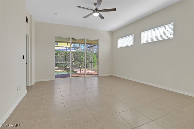 unfurnished room featuring ceiling fan and light tile patterned floors