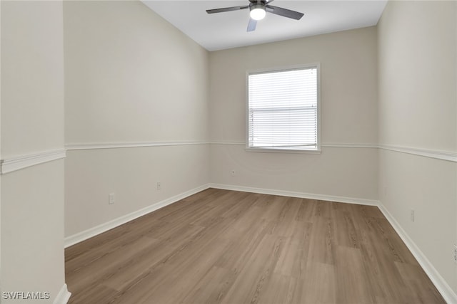 unfurnished room featuring ceiling fan and light hardwood / wood-style flooring