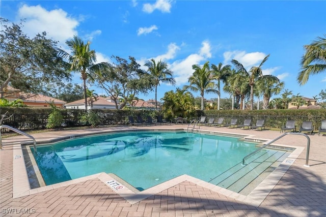 view of pool featuring a patio