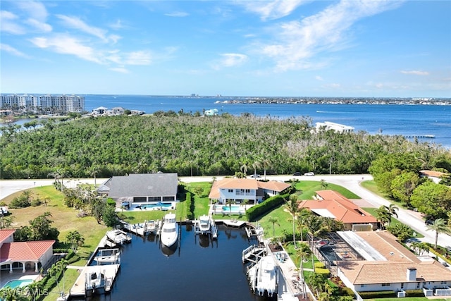 birds eye view of property featuring a water view