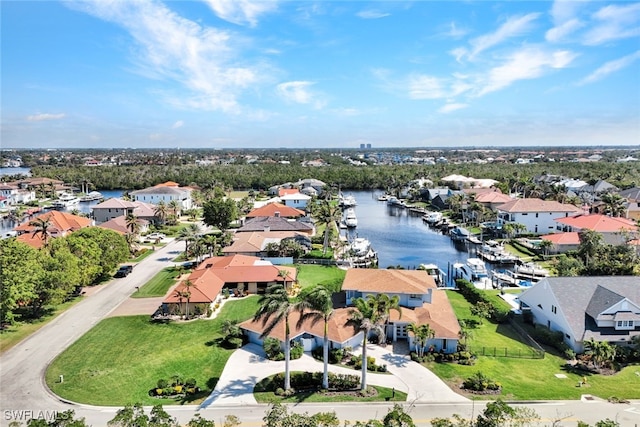 aerial view featuring a residential view and a water view