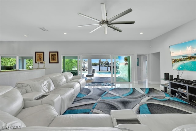 living room with recessed lighting, visible vents, a healthy amount of sunlight, and a ceiling fan