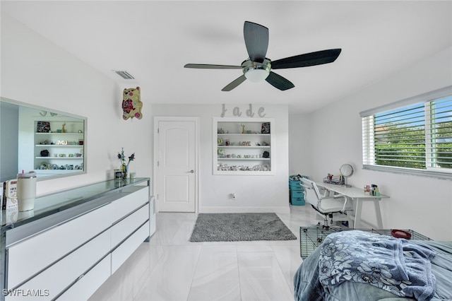 bedroom featuring visible vents, baseboards, and a ceiling fan