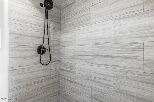 room details with a tile shower