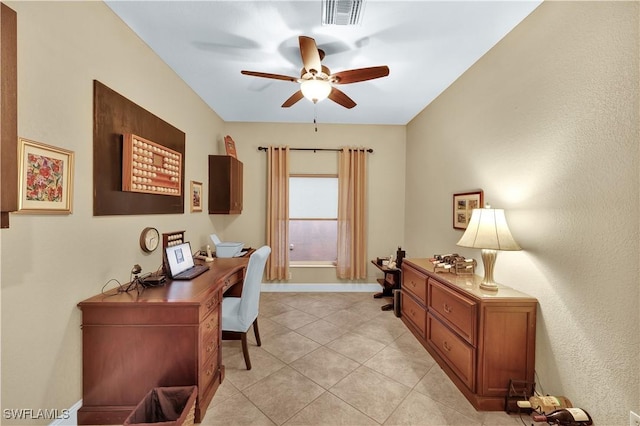 home office featuring ceiling fan and light tile patterned floors