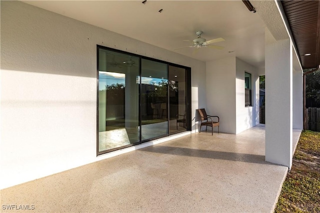 view of patio / terrace featuring ceiling fan