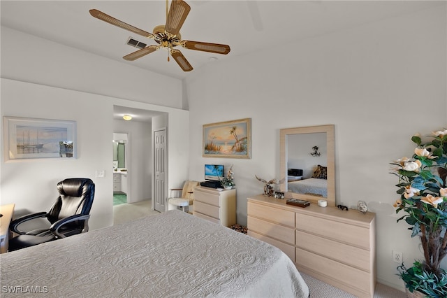 carpeted bedroom featuring ensuite bath, a closet, and ceiling fan