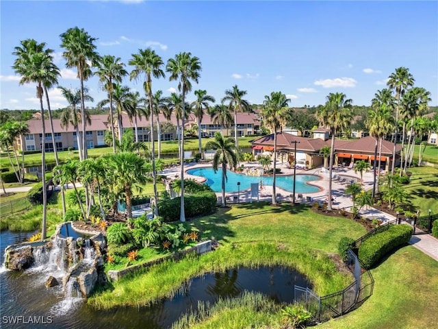 birds eye view of property featuring a water view