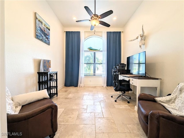 home office featuring baseboards, recessed lighting, a ceiling fan, and stone tile floors