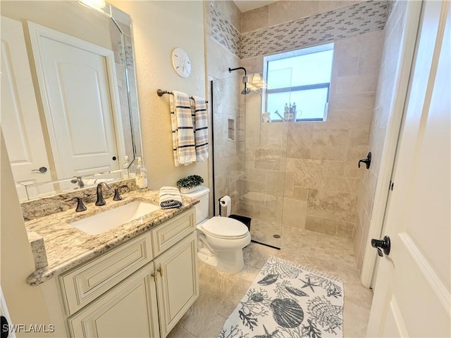 full bathroom featuring a walk in shower, toilet, and vanity