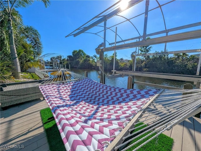 dock area featuring a water view and boat lift