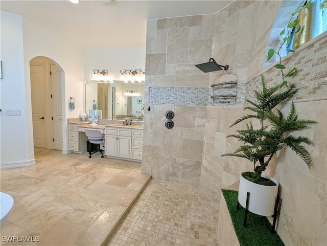 full bath with vanity and walk in shower