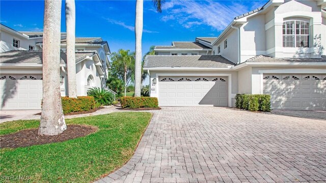 front of property featuring a garage