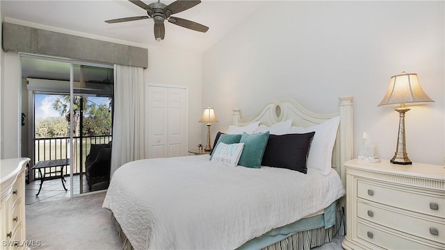 carpeted bedroom featuring access to outside, a closet, ceiling fan, and vaulted ceiling