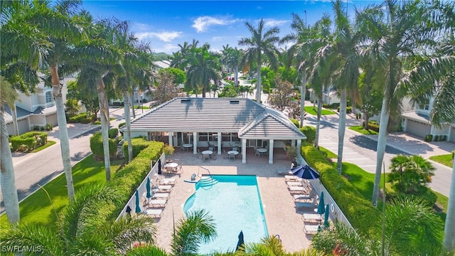 view of swimming pool with a patio