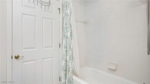 bathroom featuring shower / bath combination with curtain