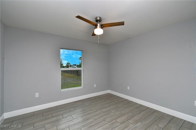 unfurnished room with ceiling fan