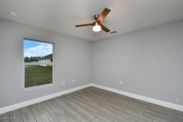 spare room featuring ceiling fan