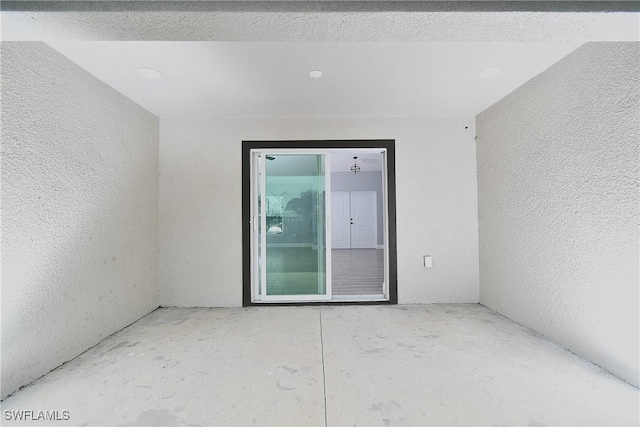 empty room featuring concrete floors