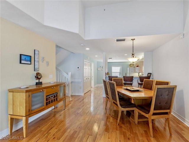 dining space featuring light hardwood / wood-style floors