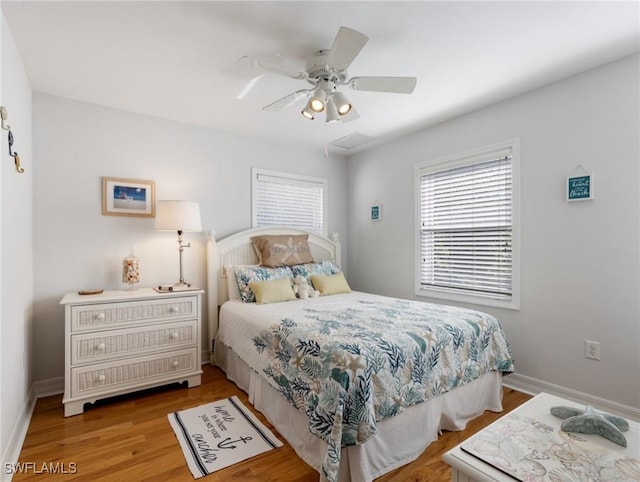 bedroom featuring wood-type flooring and ceiling fan