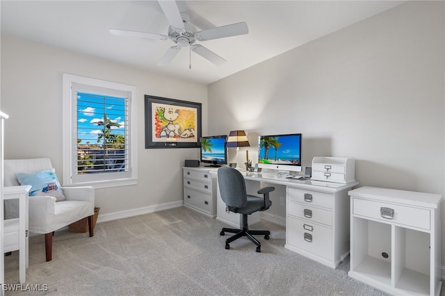 office area featuring ceiling fan and light colored carpet