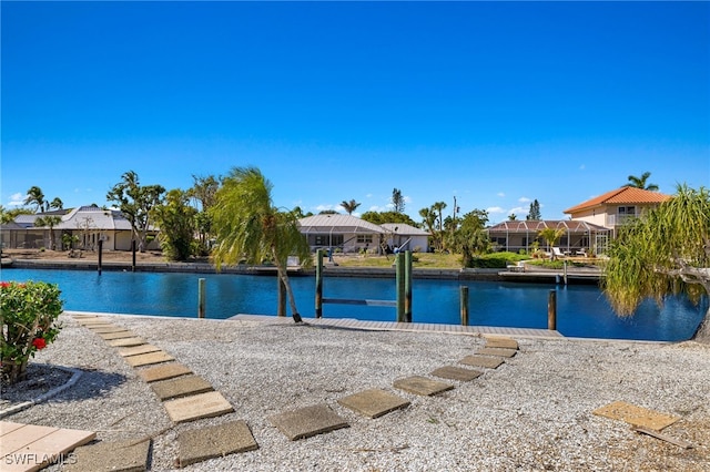 view of pool with a water view