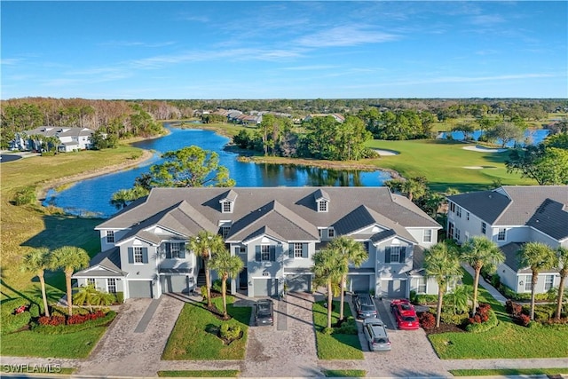 drone / aerial view with a water view