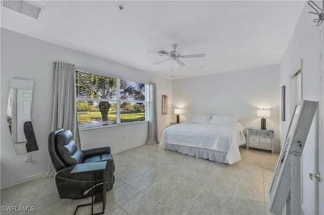 bedroom featuring light tile patterned floors and ceiling fan