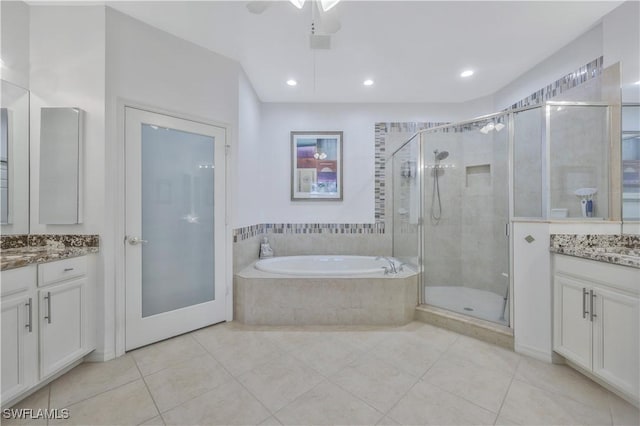 bathroom featuring vanity, tile patterned floors, shower with separate bathtub, and ceiling fan