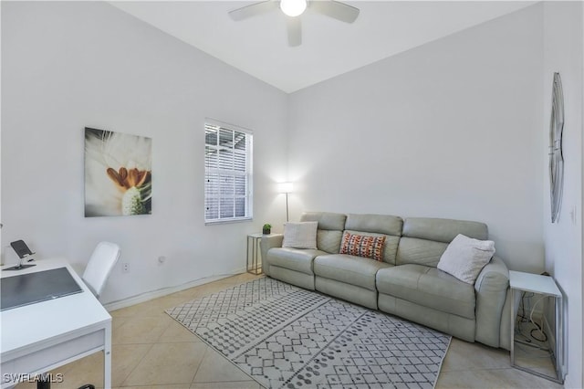 living room featuring ceiling fan and light tile patterned floors