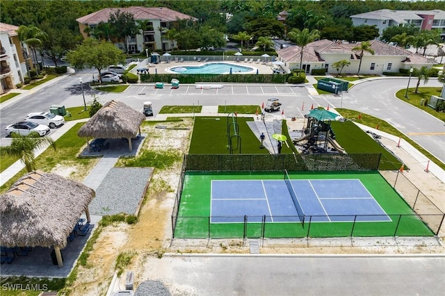 birds eye view of property with a residential view