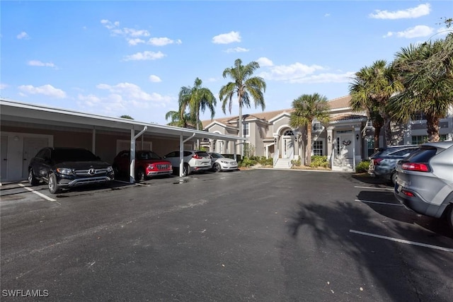 view of parking featuring a carport