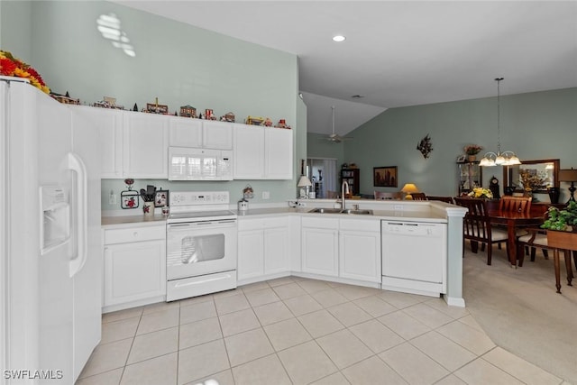 kitchen featuring white cabinetry, sink, hanging light fixtures, kitchen peninsula, and white appliances