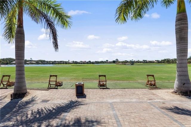 view of patio featuring a water view