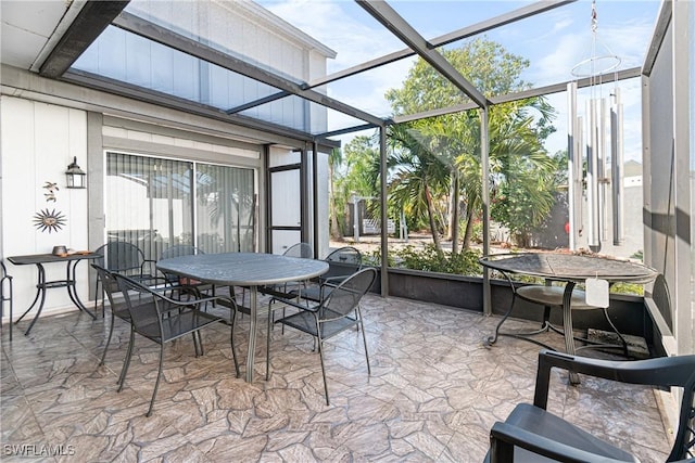 sunroom / solarium featuring a wealth of natural light