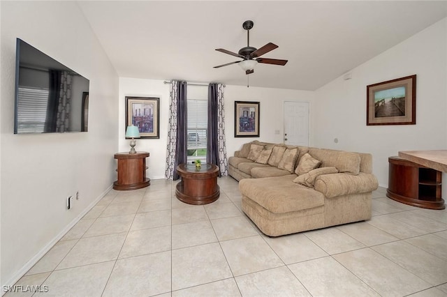 living room with vaulted ceiling, light tile patterned floors, and ceiling fan