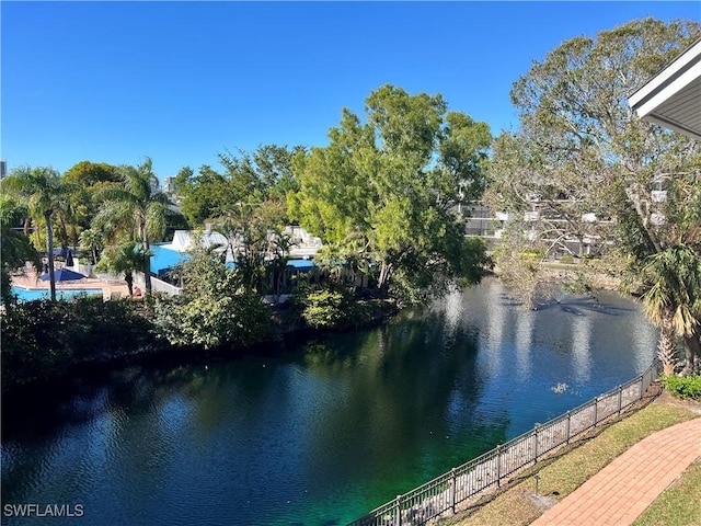 view of water feature with fence