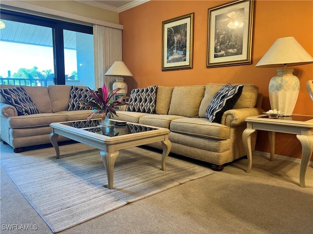 living room with baseboards, carpet floors, and crown molding